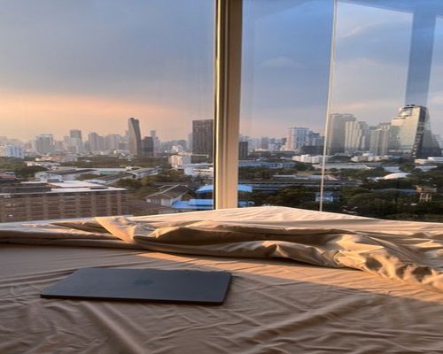 A quiet evening setting in a modern Bangkok apartment showing a balanced lifestyle